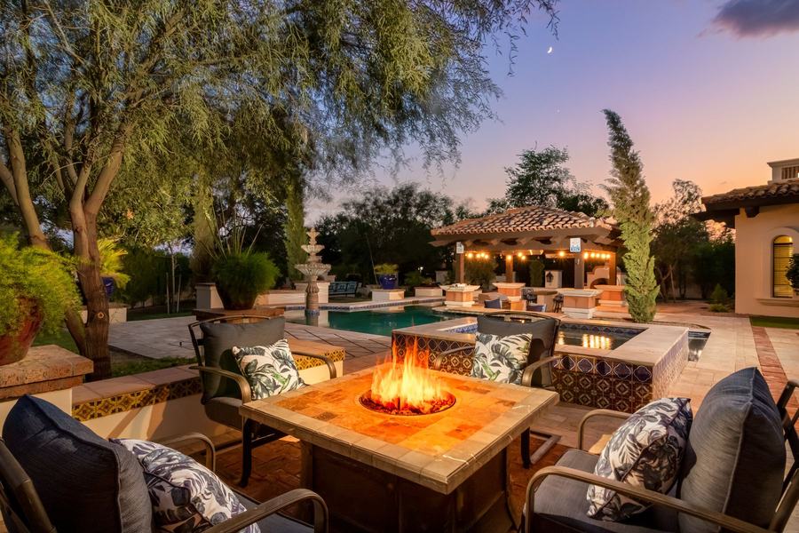 Fire pit and pool at night, Valley Vista Estate