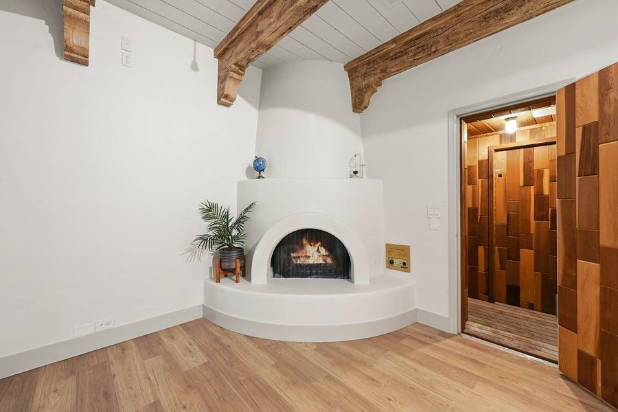 Primary sitting room, fireplace and sauna, Valley Vista Estate
